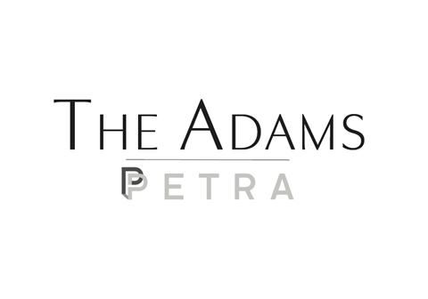 the adams petra logo with black text on a white background