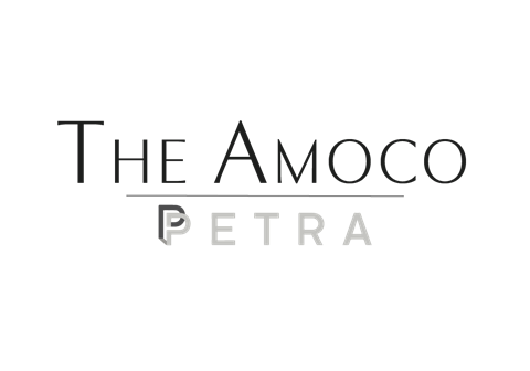 the amoeba petra logo with the amoco petra in darkness