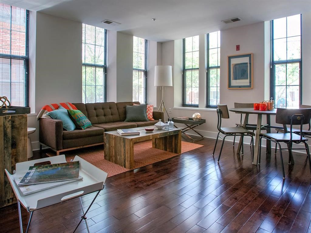 a living room with a couch and a table