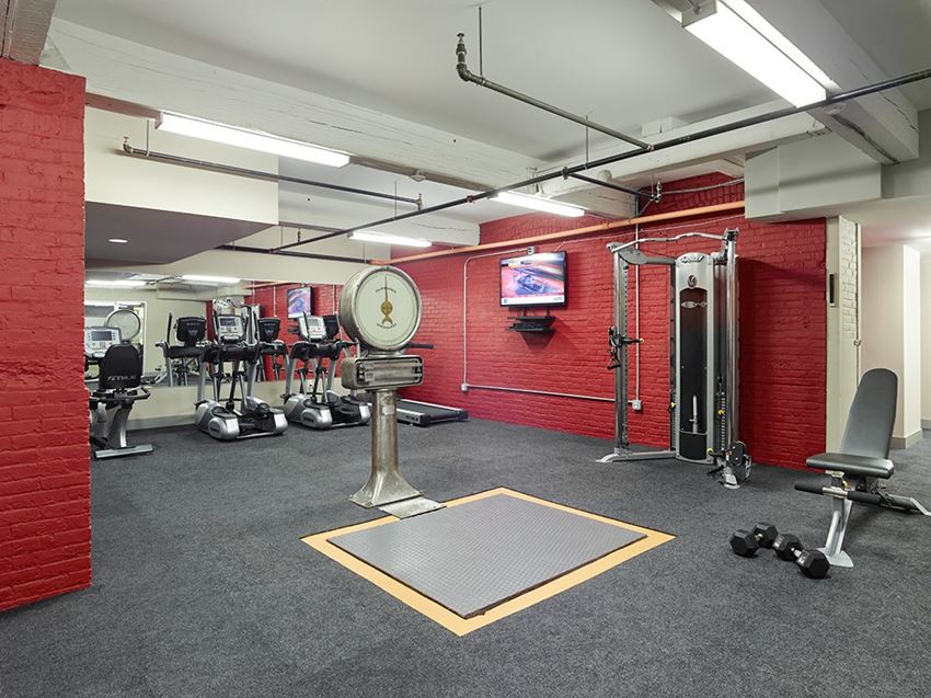 the gym at the flats at big tex apartments