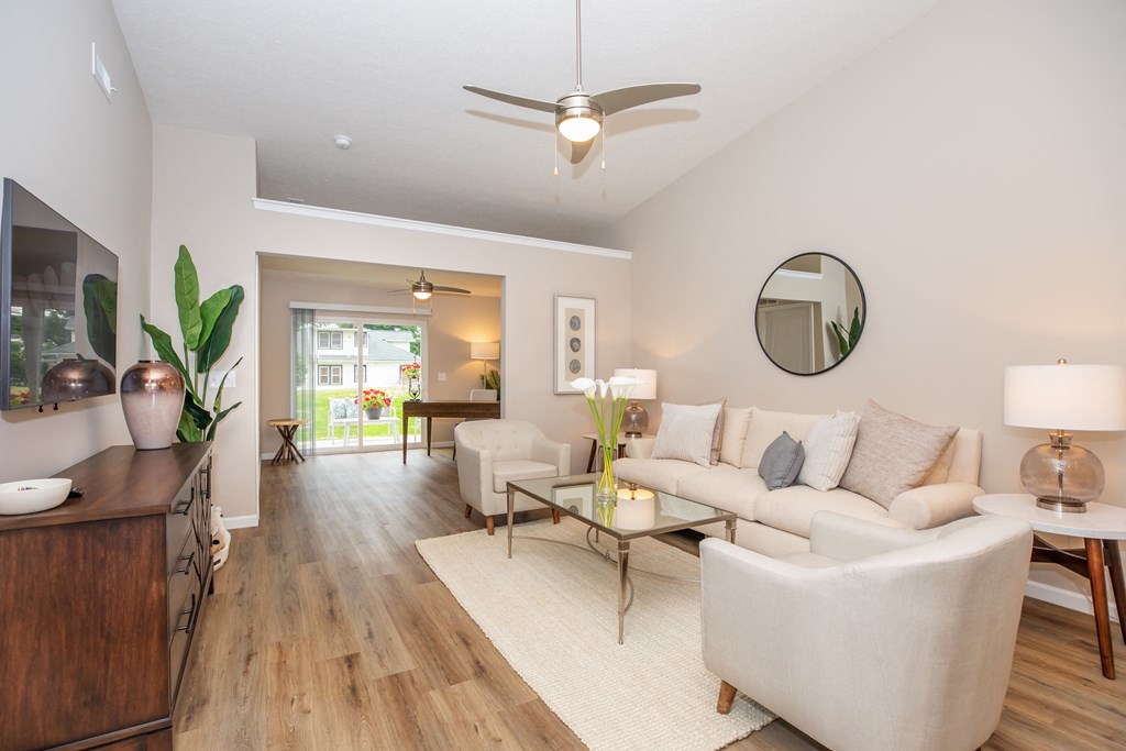 Furnished living room with ceiling fan