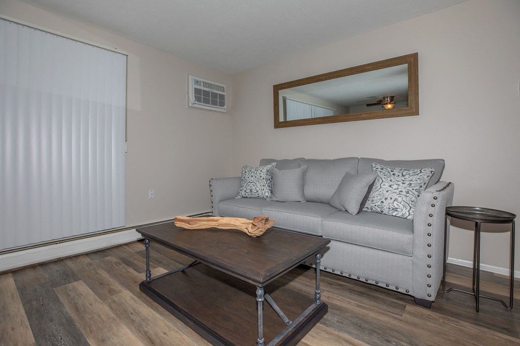 a living room with a couch and a coffee table