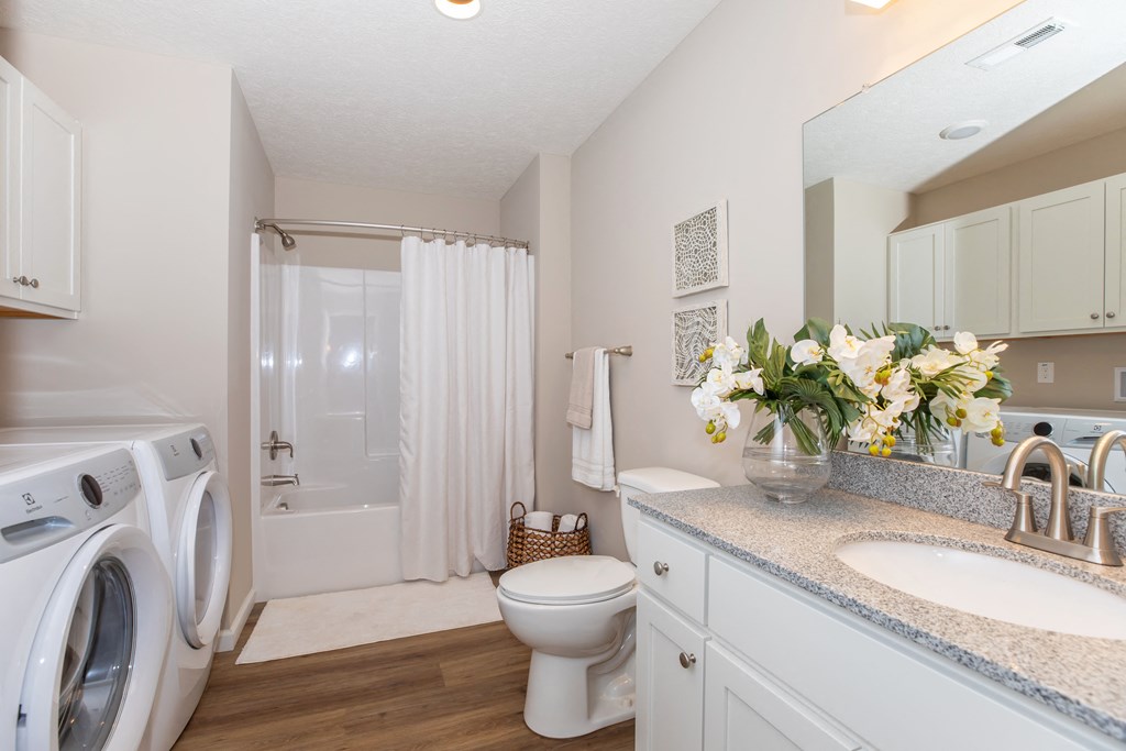 Master bathroom with full shower/ tub