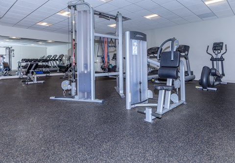 Fitness center with dumbbells at Parkview Apartments, Richmond Heights, Ohio