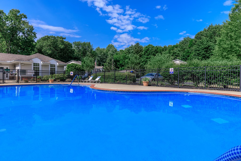the pool at the whispering winds apartments in pearland, tx