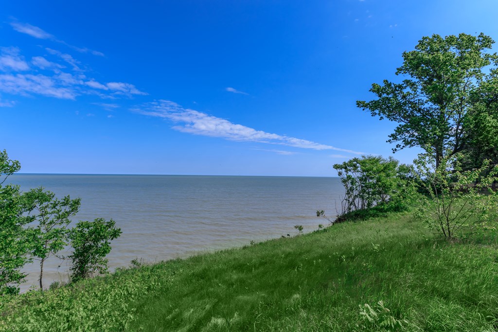a view of the lake from a hillside