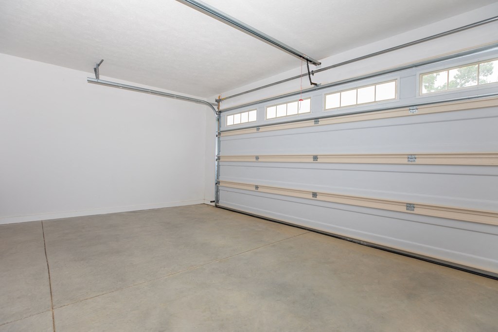 Interior attached two car garage with private entry