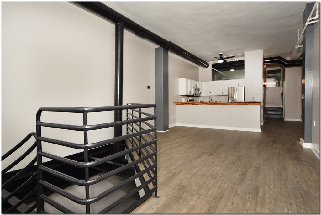 stairs and kitchen and living room