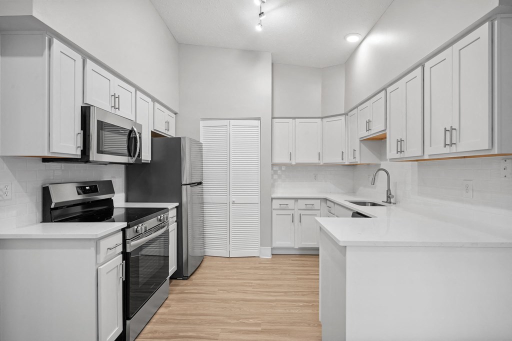 White kitchen at Concord Place Apartments