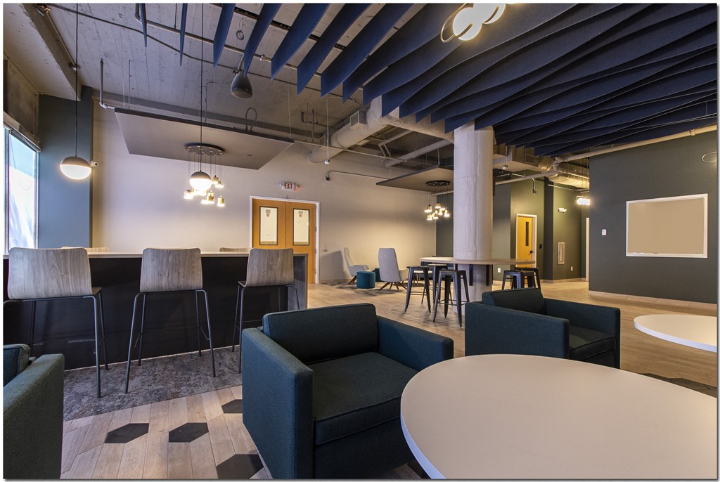 a large open space with chairs and tables