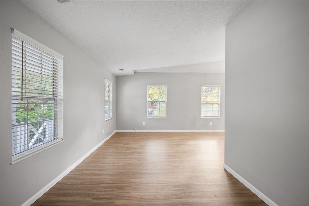 living room with wood floors and a window