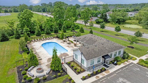 A house with a pool in the backyard.