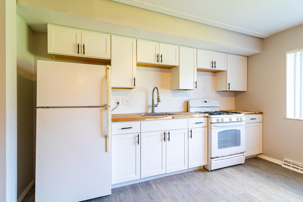 Upgraded kitchen with white appliances