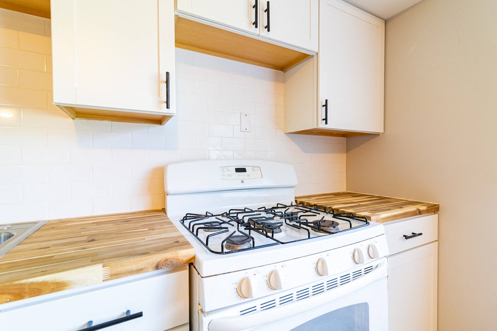 Upgraded kitchen with white gas stove