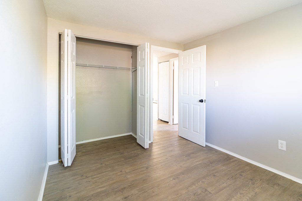 Second bedroom with vinyl plank flooring