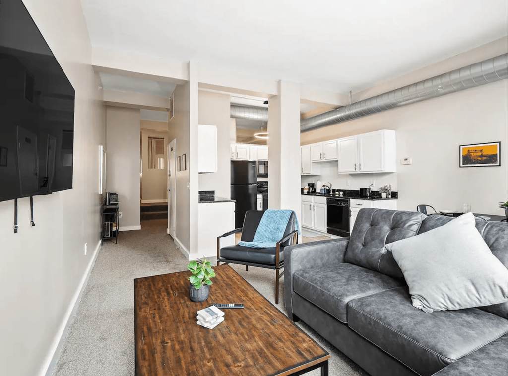 a living room with a couch and a coffee table