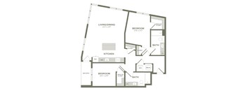A floor plan of a home with a living/dining area, kitchen, and two bedrooms.
