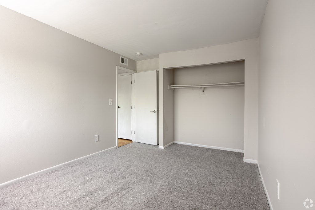 A room with a carpeted floor and white walls. at Commons At Waters Edge, Columbus Ohio