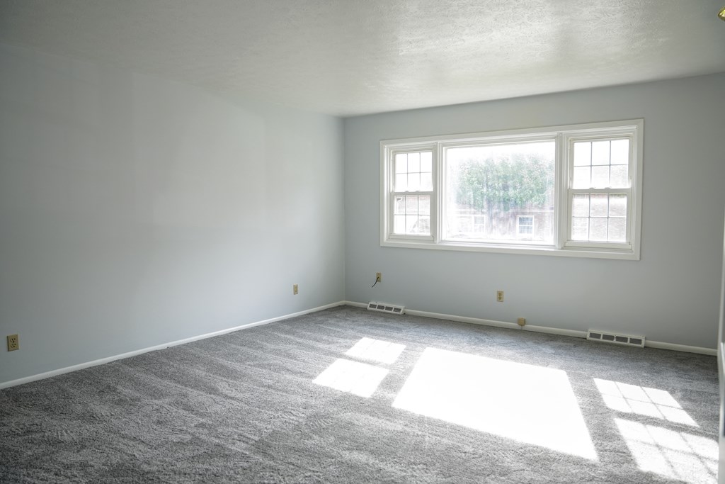 a living area with a large window