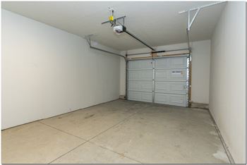 Attached one car garage at Spencer Court