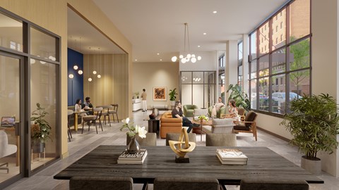 A modern living room with a long wooden table and chairs.