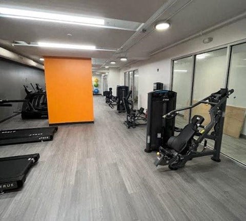 a room filled with lots of exercise equipment