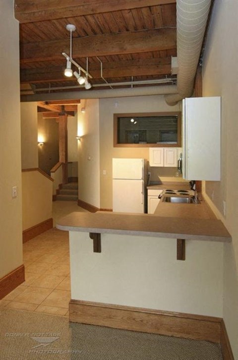 a kitchen with a counter and a sink