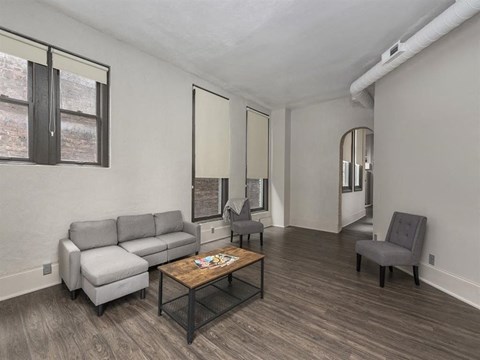 a living room with a couch and a coffee table