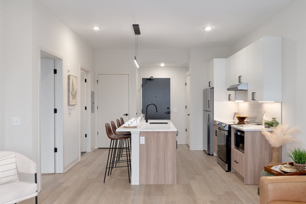 a kitchen with a large island and a dining room in Rocky River, OH 44116
