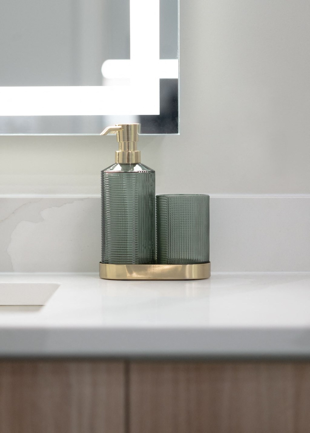 a bathroom with a sink and a soap dispenser in Rocky River, OH 44116