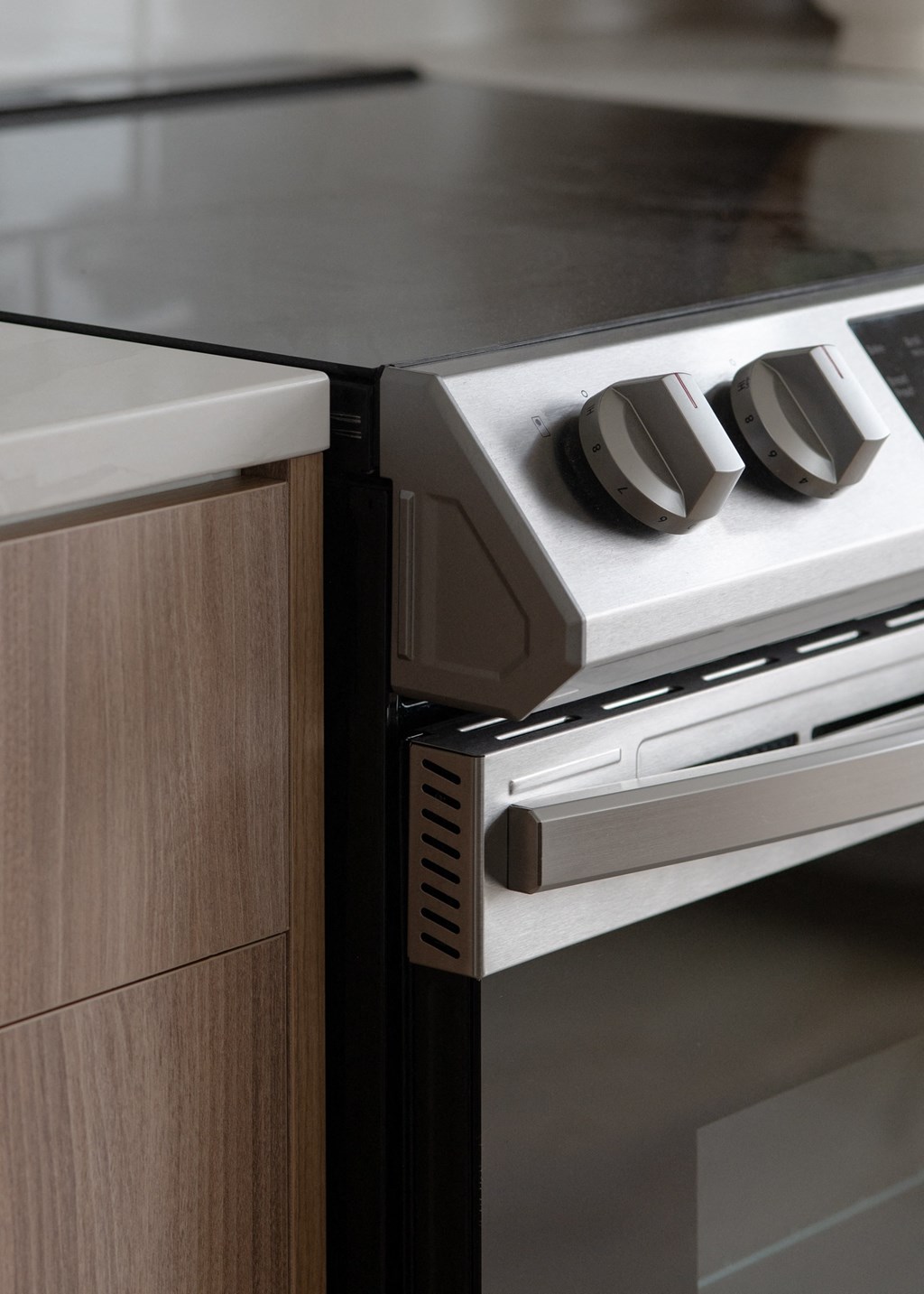 a kitchen with a stove top oven and a counter top in Rocky River, OH 44116
