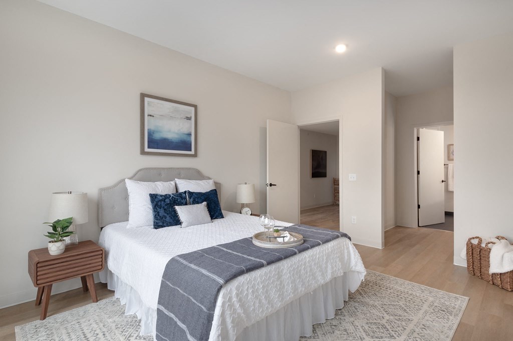 a bedroom with a large bed and a rug in Rocky River, OH 44116