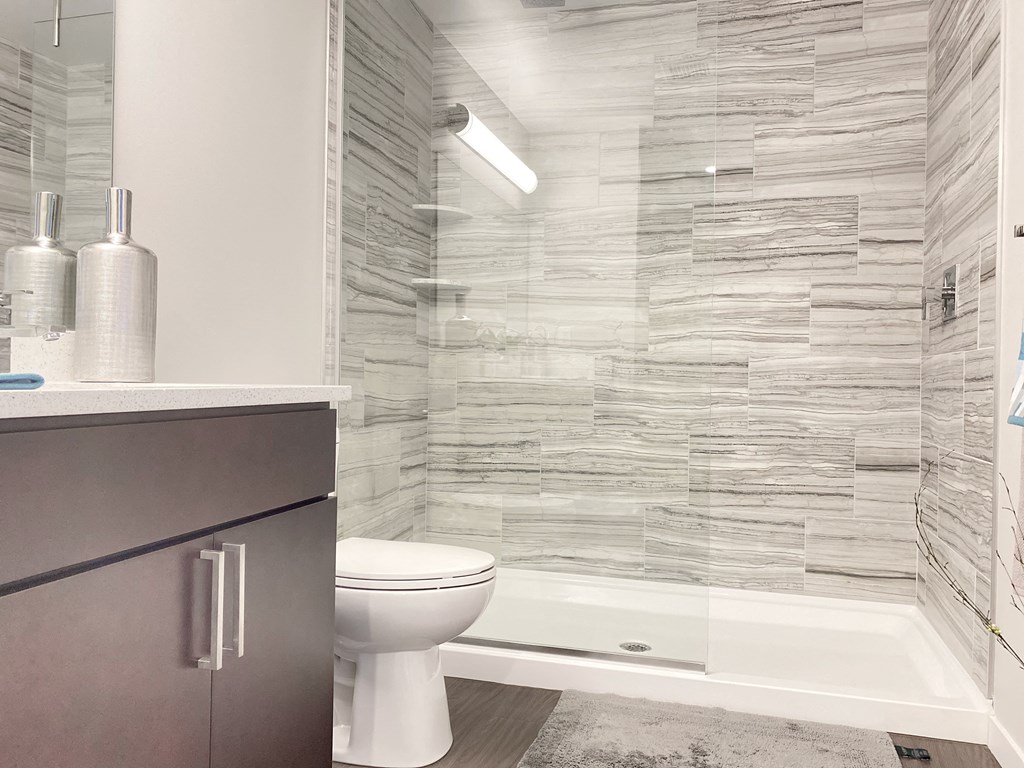 full bathroom with walk in shower