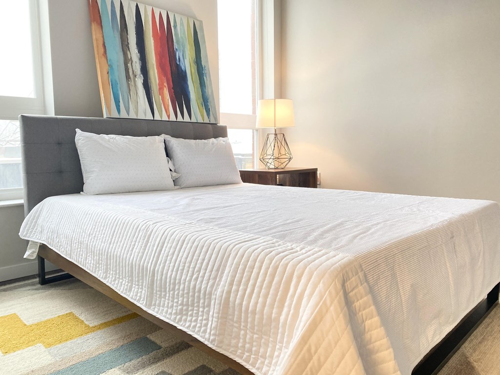 Bedroom with vinyl plank flooring