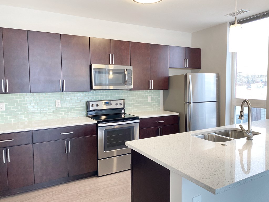 Kitchen with full stainless steel appliance package