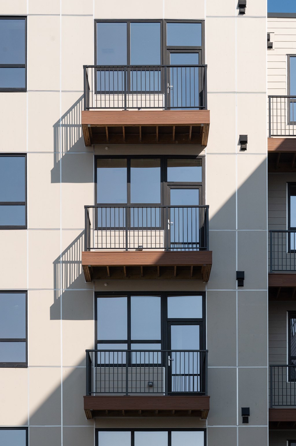 A building with balconies and windows.