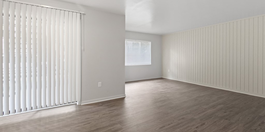 A room with wooden floors and white walls.at Commons At Waters Edge, Columbus, 43232