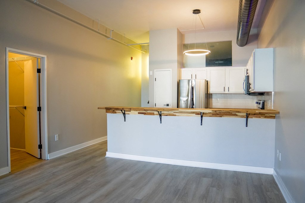 a kitchen and a breakfast bar