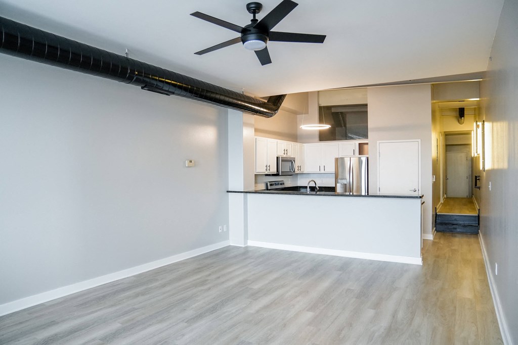 living room with a ceiling fan