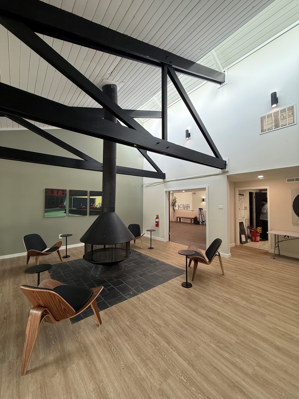 Lounge room with a fireplace and chairs. at Commons At Waters Edge, Columbus Ohio