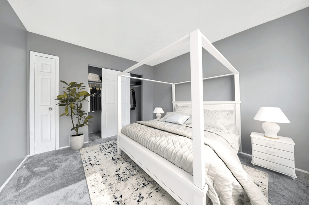 a bedroom at Nottingham Place Apartments