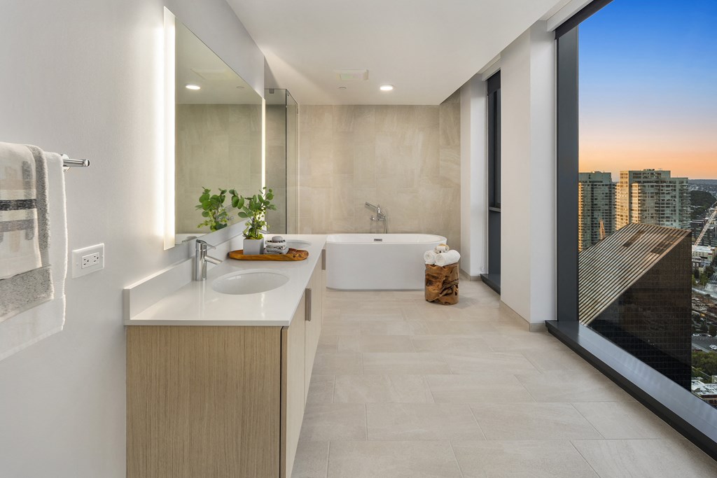 a bathroom with a tub and a sink