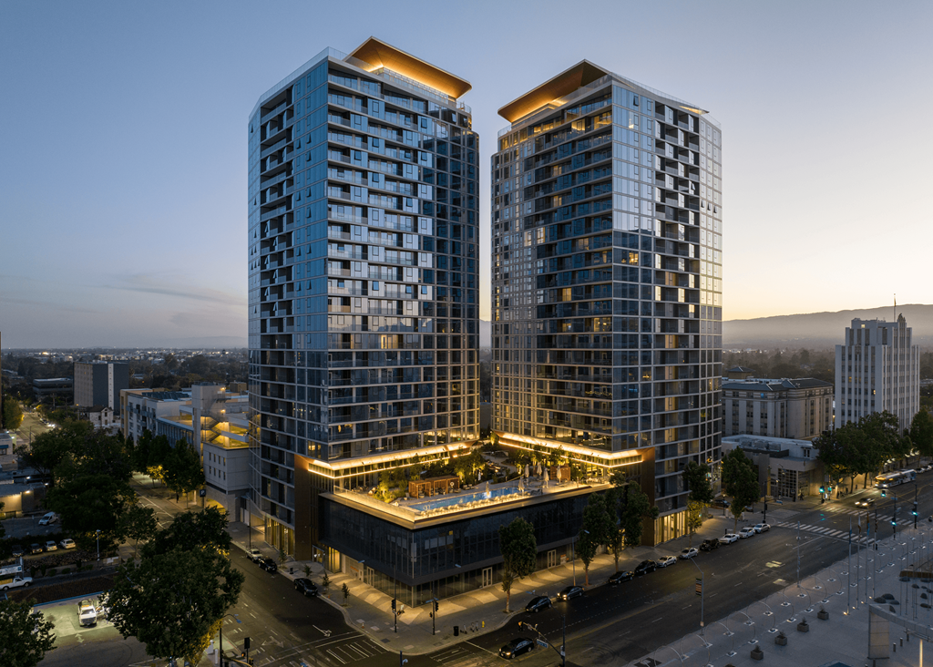 miro towers at sunset drone