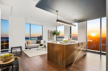 the modern living room with sunset view