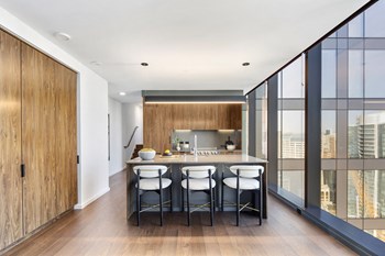 the modern kitchen with stone backsplash and soft close cabinetry - Photo Gallery 16