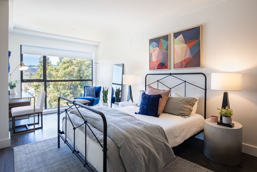 Logan bedroom with large windows  and light