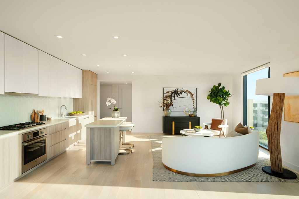 open floorplan living room with light finishes