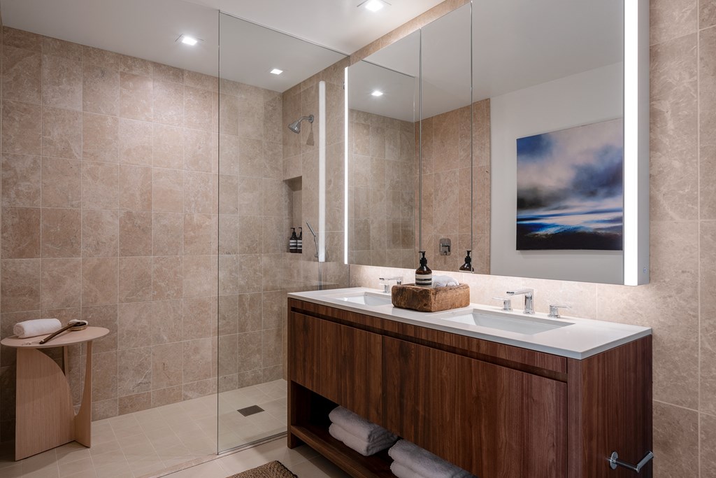 bathroom with natural wood finishes