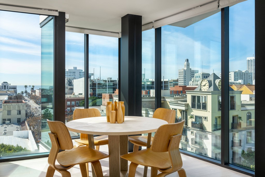 Luxury Santa Monica home with floor to ceiling windows, natural light, spacious floorplan and sweeping ocean views