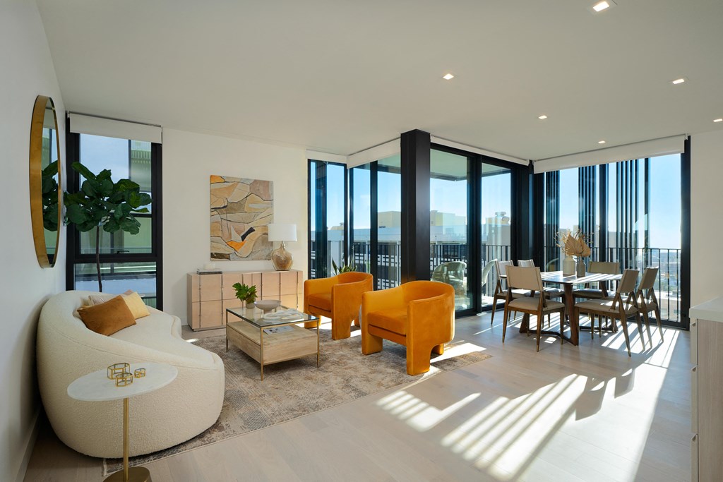 spacious open floorplan with floor to ceiling windows